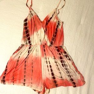 Pink and cream size small romper
